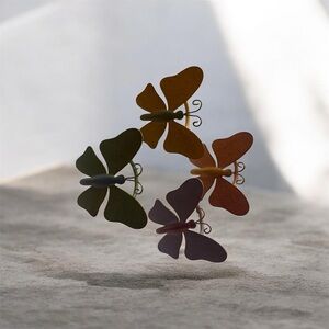 The Pier One Metal Pastel Butterfly Napkin Rings